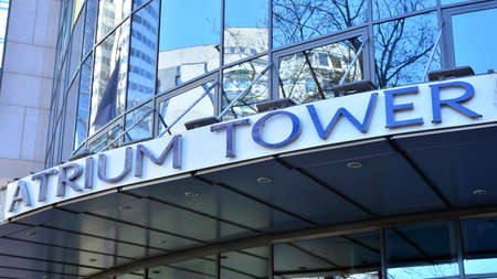 Warsaw, Poland. 8 April 2020. Sign Atrium Tower. Company signboard Atrium Tower.のeditorial素材