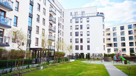 Warsaw, Poland. 10 April 2020. Modern apartment building in Zoliborz district on a sunny day with a...