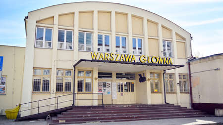 Warsaw, Poland. 18 April 2020. Sign Warsaw. Company signboard Warsaw Glowna.のeditorial素材