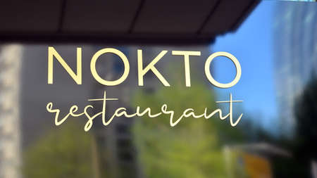 Warsaw, Poland. 30 April 2020. Sign Nokto Restaurant. Company signboard Nokto Restaurant.