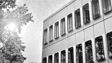 Abstract modern architecture with high contrast black and white tone. Architecture of geometry at glass window - monochrome.のeditorial素材