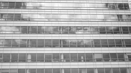 Abstract modern architecture with high contrast black and white tone. Architecture of geometry at glass window - monochrome.のeditorial素材