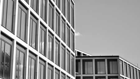 Abstract modern architecture with high contrast black and white tone. Architecture of geometry at glass window - monochrome.のeditorial素材