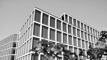 Abstract modern architecture with high contrast black and white tone. Architecture of geometry at glass window - monochrome.のeditorial素材