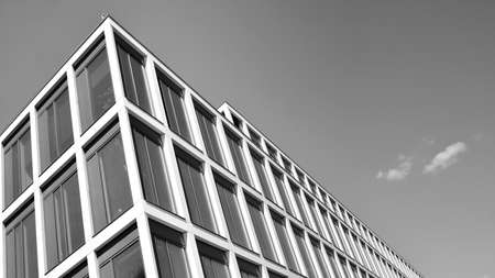 Abstract modern architecture with high contrast black and white tone. Architecture of geometry at glass window - monochrome.のeditorial素材