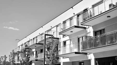 Detail of a new modern apartment building. Black and white.