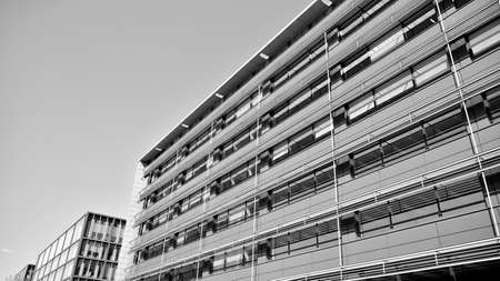 Abstract modern architecture with high contrast black and white tone. Architecture of geometry at glass window - monochrome.のeditorial素材