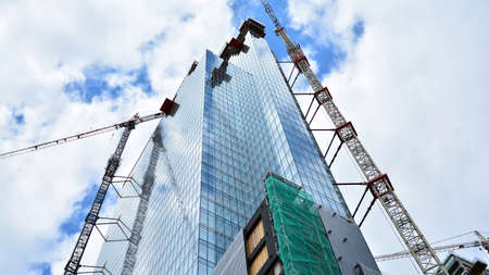 Warsaw, Poland. 14 June 2020. Roundabout Daszynski. New Skyscrapers in the financial district of downtown Warsaw. New buildings being built.のeditorial素材