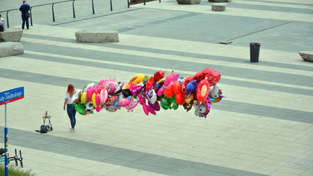 Warsaw, Poland. 14 June 2020. Girl sell balloons at vistula boulevards