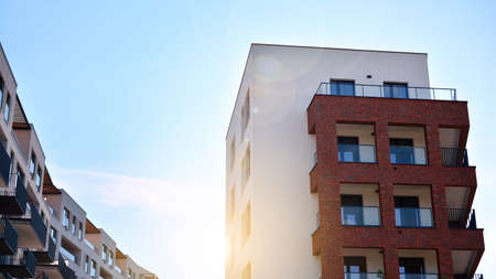 Contemporary residential building exterior in the daylight. Modern and new apartment building....