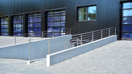 Facade of a modern navy blue warehouseの写真素材