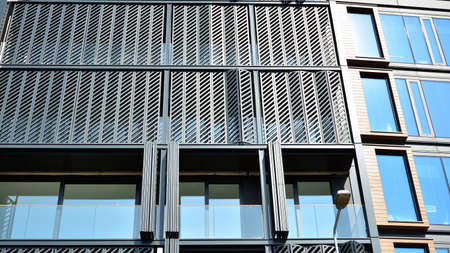 New housing landscape. Facade of a new multi-story residential building.