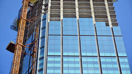 High-rise building under construction. Modern office building.