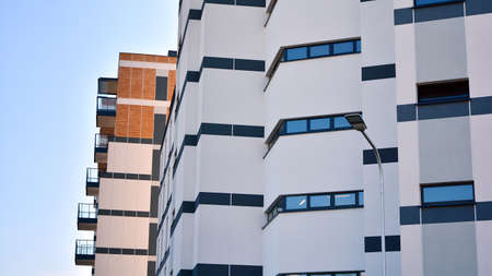 Architectural details of modern apartment building. Modern european residential apartment building...