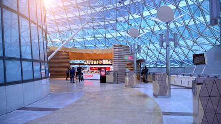 Warsaw, Poland. 27 October 2020. Wide angle view of empty food court at Zlote Tarasy shopping mall....