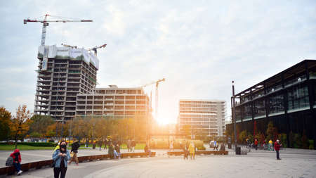 Warsaw, Poland. 27 October 2020. Office buildings under construction in Warsaw center business. Forest office building.のeditorial素材
