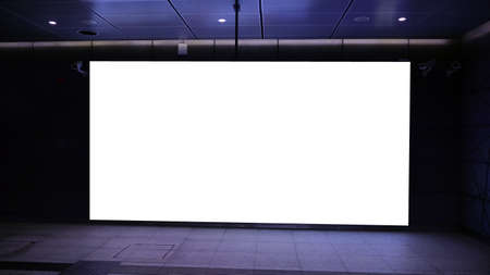 Blank billboard located in subway for advertising.