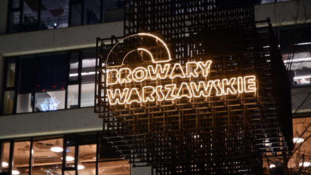 Warsaw, Poland. 24 November 2020. Modern office building Browary Warszawskie in night.