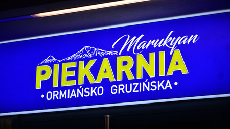 Warsaw, Poland. 10 January 2021. Sign Marukyan Armenian-Georgian Bakery. Company signboard Marukyan Piekarnia Armensko Gruzinskaのeditorial素材