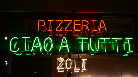 Warsaw, Poland. 10 January 2021. Sign Pizzeria Ciao a Tutti Zoli. Company signboard Pizzeria Ciao a Tutti Zoli.のeditorial素材
