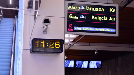 Warsaw, Poland. 13 January 2021. A modern live departure train board above a Warsaw metro line 2...
