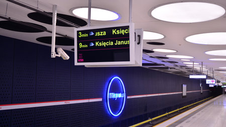 Warsaw, Poland. 13 January 2021. A modern live departure train board above a Warsaw metro line 2...