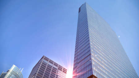Concept for real estate and corporate construction..The modern office building of the orange morning...