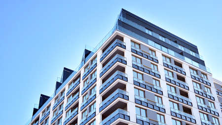Modern apartment building in sunny day. Exterior, residential house facade.の写真素材