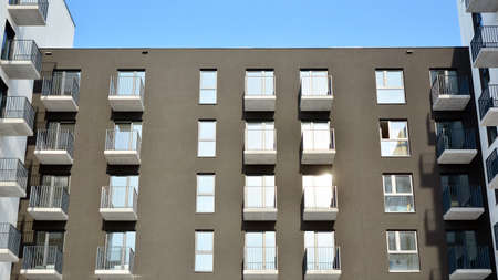 Modern apartment building in sunny day. Exterior, residential house facade.