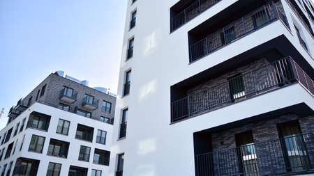Modern apartment building in sunny day. Exterior, residential house facade.