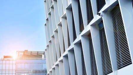 Modern office block with sunny beautiful sky. Bright outlook for business.