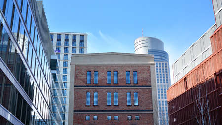 Revitalized red brick building and modern office building.