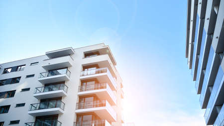 Apartment residential house and home facade architecture and outdoor facilities. Blue sky on the...