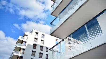 Multistoried modern, new and stylish living block of flats. Newly built apartment building.