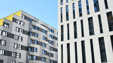 Fragment of glass and metal facade walls. Commercial office buildings. Abstract modern business architecture.の写真素材