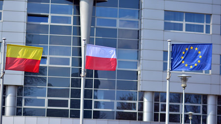 Warsaw, Poland. 19 April 2021. Three flags on the mast: Warsaw, Poland and the European Unionのeditorial素材