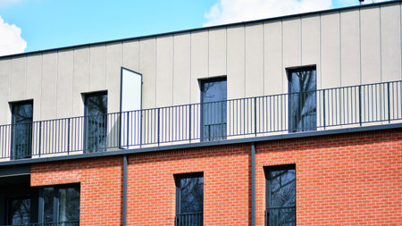 Architectural details of modern apartment building. Modern european residential apartment building...
