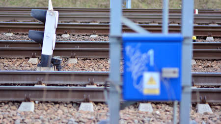 Electric iron box, switches, detail on the railway tracks at the railway station.