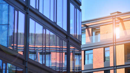 A residential building and an adjacent office building. Modern urban development. Buildings against...