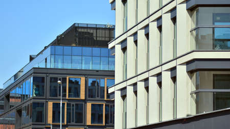 A residential building and an adjacent office building. Modern urban development. Buildings against...