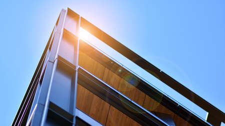 A fragment of the steel and glass metal facade of building. Detail architecture steel and glass...
