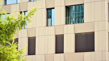 Architectural details of modern apartment building. Modern european residential apartment building...