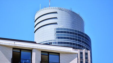 A residential building and an adjacent office building. Modern urban development. Buildings against...