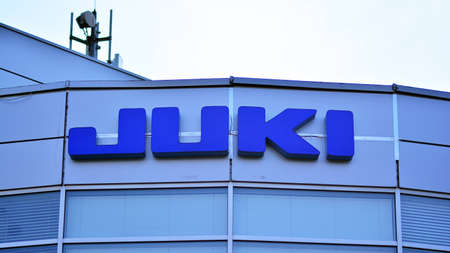 Warsaw, Poland. 19 June 2021. Sign Juki on store. Company signboard Juki