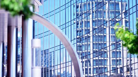 Eco architecture. Green tree and glass office building. The harmony of nature and modernity....