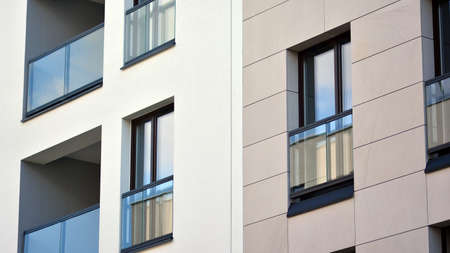 Modern apartment building on a sunny day with a blue sky. Facade of a modern apartment...