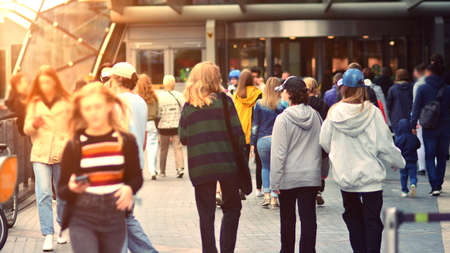 Crowded sidewalk with commuters and tourists from all over the world.の写真素材