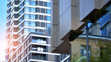 Condominium and apartment building with symmetrical modern architecture in the city downtown.の写真素材