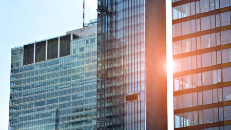 Glass office building in city center on a background close up. Urban architecture of building...