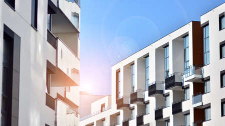 Modern apartment building on a sunny day. Architectural details and facade of a modern apartment building.の写真素材